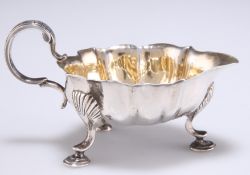 A SMALL GEORGE III SILVER SAUCE BOAT