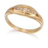 AN 18 CARAT GOLD DIAMOND FIVE STONE RING