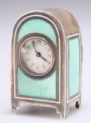 A SMALL CONTINENTAL GREEN ENAMEL CLOCK