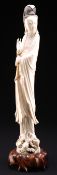 A CHINESE IVORY FIGURE OF A MAIDEN, LATE 19TH CENTURY