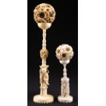 TWO CANTONESE IVORY PUZZLE BALLS ON STANDS