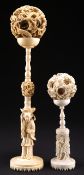 TWO CANTONESE IVORY PUZZLE BALLS ON STANDS