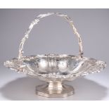 A SHEFFIELD PLATE ROCOCO REVIVAL SWING-HANDLE BASKET