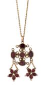 A GARNET AND SEED PEARL PENDANT / BROOCH ON CHAIN