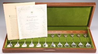 A CASED SET OF TWELVE ROYAL HORTICULTURAL SOCIETY SILVER FLOWER SPOONS