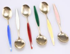 A SET OF SIX NORWEGIAN SILVER GILT HARLEQUIN ENAMEL COFFEE SPOONS