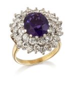 AN AMETHYST AND DIAMOND CLUSTER RING