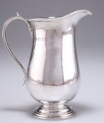 AN ELIZABETH II SILVER JUG