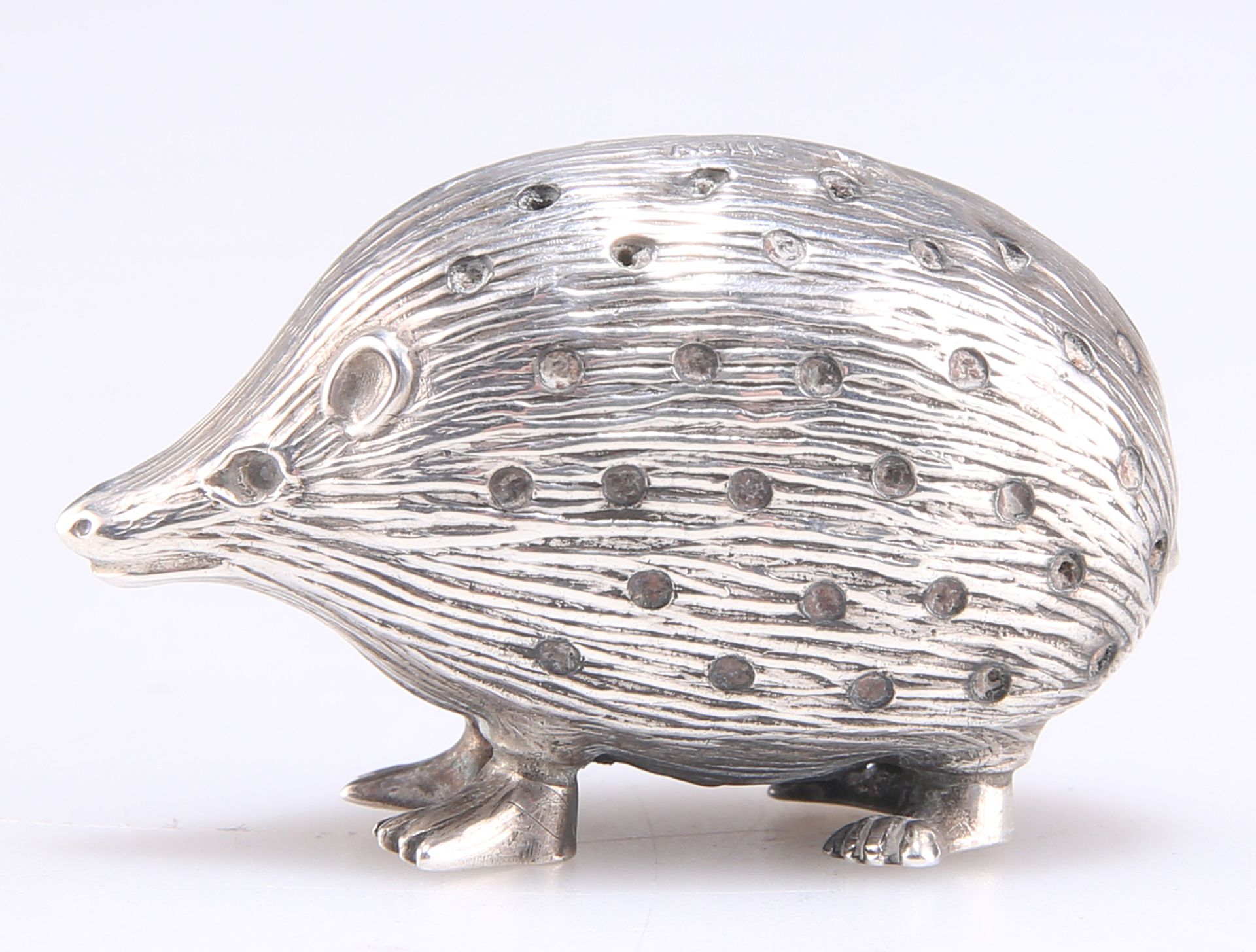 AN EDWARDIAN SILVER NOVELTY PIN CUSHION