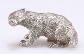 AN ELIZABETH II CAST SILVER MODEL OF A BADGER