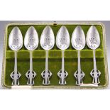 A SET OF SIX PEWTER SPOONS, IN THE STYLE OF ARCHIBALD KNOX FOR LIBERTY & CO
