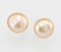 A PAIR OF CULTURED BUTTON PEARL STUD EARRINGS