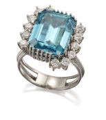 A BLUE ZIRCON AND DIAMOND CLUSTER RING