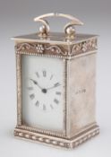 A GEORGE V SILVER TRAVELLING CLOCK