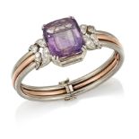 AN AMETHYST AND DIAMOND BANGLE