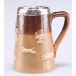 A DOULTON LAMBETH SILVER-MOUNTED MINIATURE TANKARD