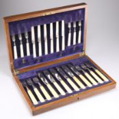 A SET OF SIX GEORGE V SILVER AND IVORY-HANDLED FISH KNIVES AND FORKS