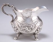 A ROCOCO REVIVAL HEAVY SILVER CREAM JUG