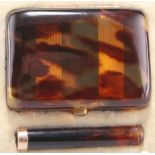 AN EARLY 20TH CENTURY TORTOISESHELL MATCH CASE AND CIGARETTE HOLDER