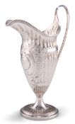 A GEORGE III SILVER CREAM JUG