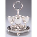 AN EDWARDIAN SILVER-PLATED EGG CRUET