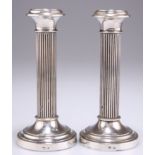 A PAIR OF DUTCH SILVER CANDLESTICKS