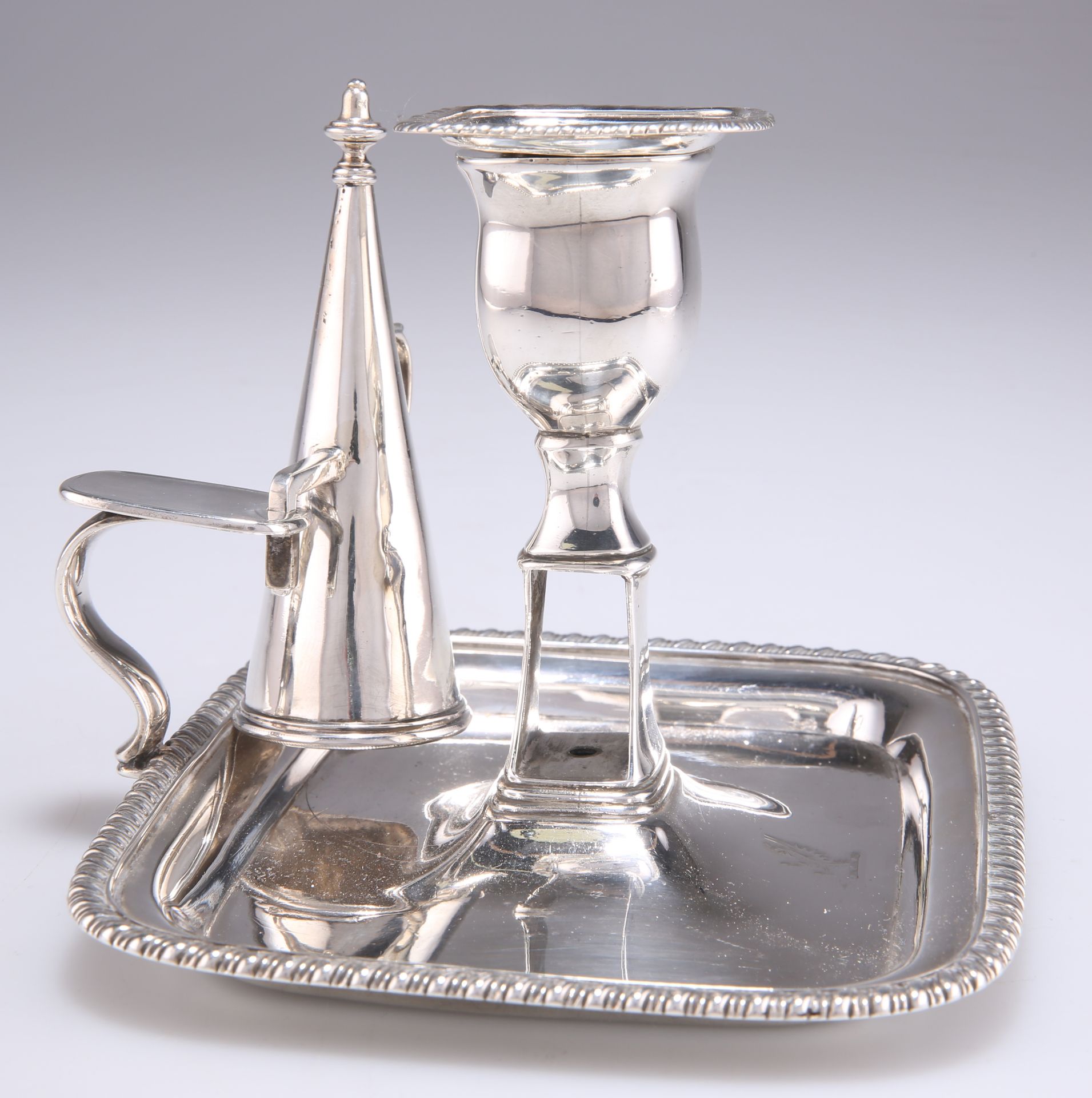 A GEORGE III SILVER CHAMBERSTICK