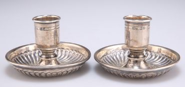 A LATE VICTORIAN SILVER 'BRIGHTON BUN' DOUBLE TRAVELLING CANDLESTICK COMPENDIUM