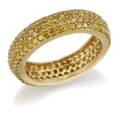 A 9 CARAT GOLD FANCY YELLOW DIAMOND ETERNITY RING