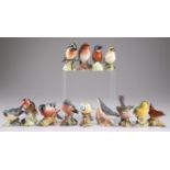 A COLLECTION OF THIRTEEN BESWICK MODELS OF BIRDS