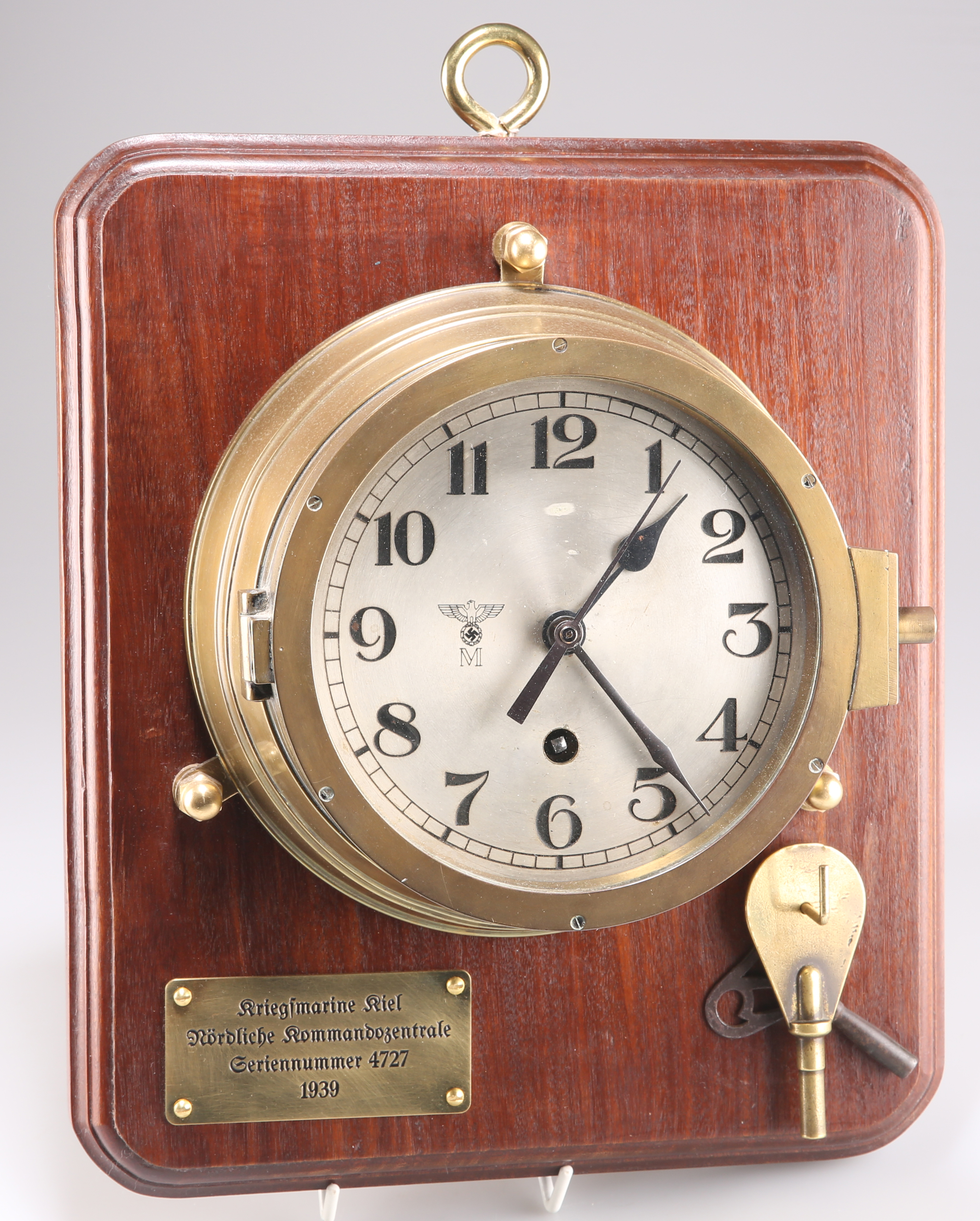 A THIRD REICH KRIEGSMARINE BRASS BULKHEAD CLOCK