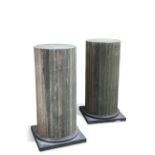A LARGE PAIR OF PAINTED WOODEN PEDESTALS