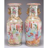 A PAIR OF 19TH CENTURY CANTONESE FAMILLE ROSE VASES