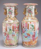 A PAIR OF 19TH CENTURY CANTONESE FAMILLE ROSE VASES