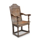 A 17TH CENTURY OAK WAINSCOT CHAIR