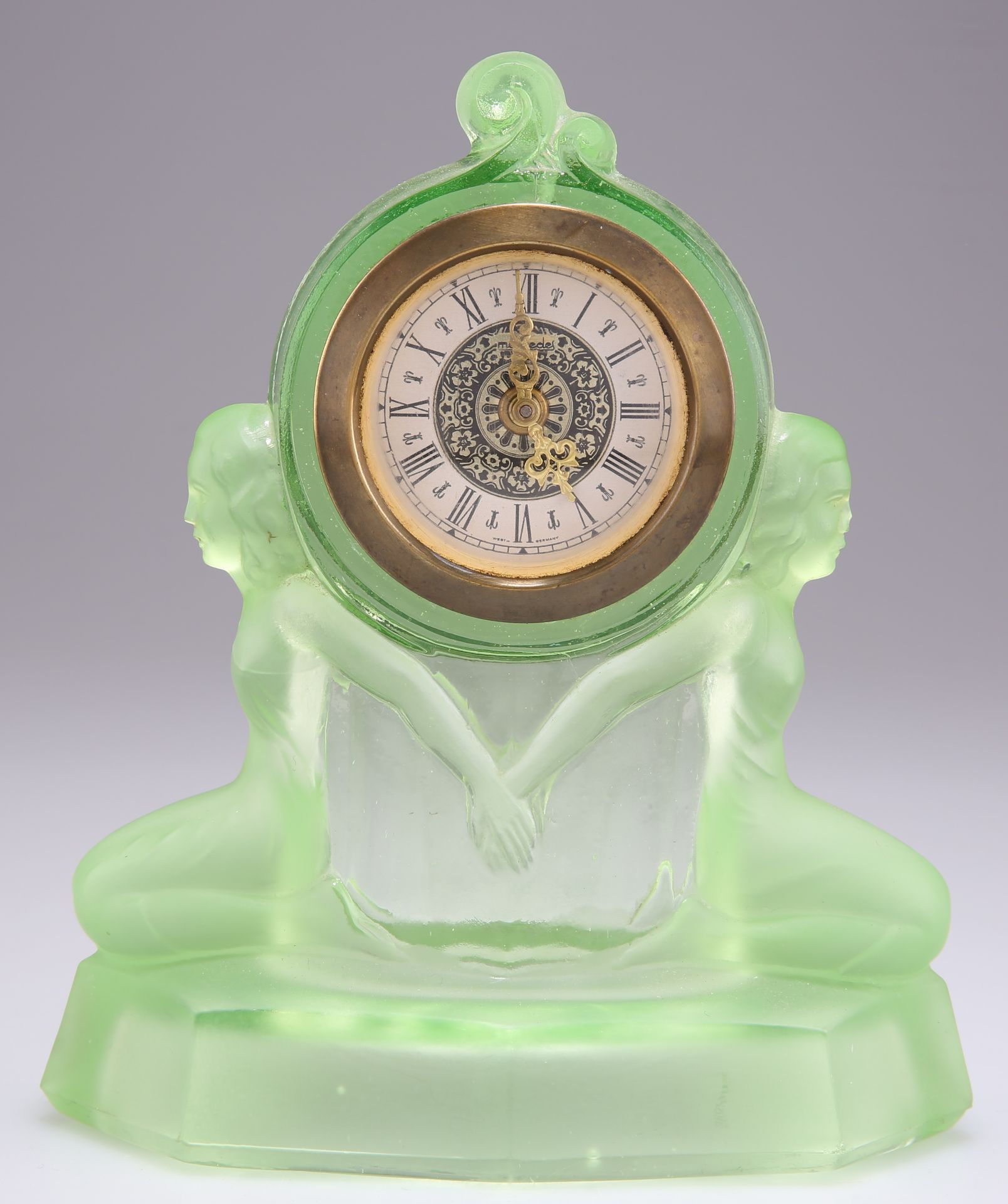 AN ART DECO URANIUM GLASS MANTEL CLOCK