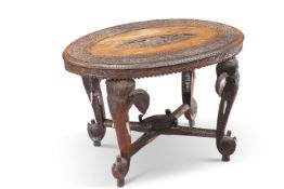 AN ANGLO-INDIAN CARVED HARDWOOD OCCASIONAL TABLE, CIRCA 1900