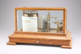 AN EARLY 20TH CENTURY OAK CASED BAROGRAPH