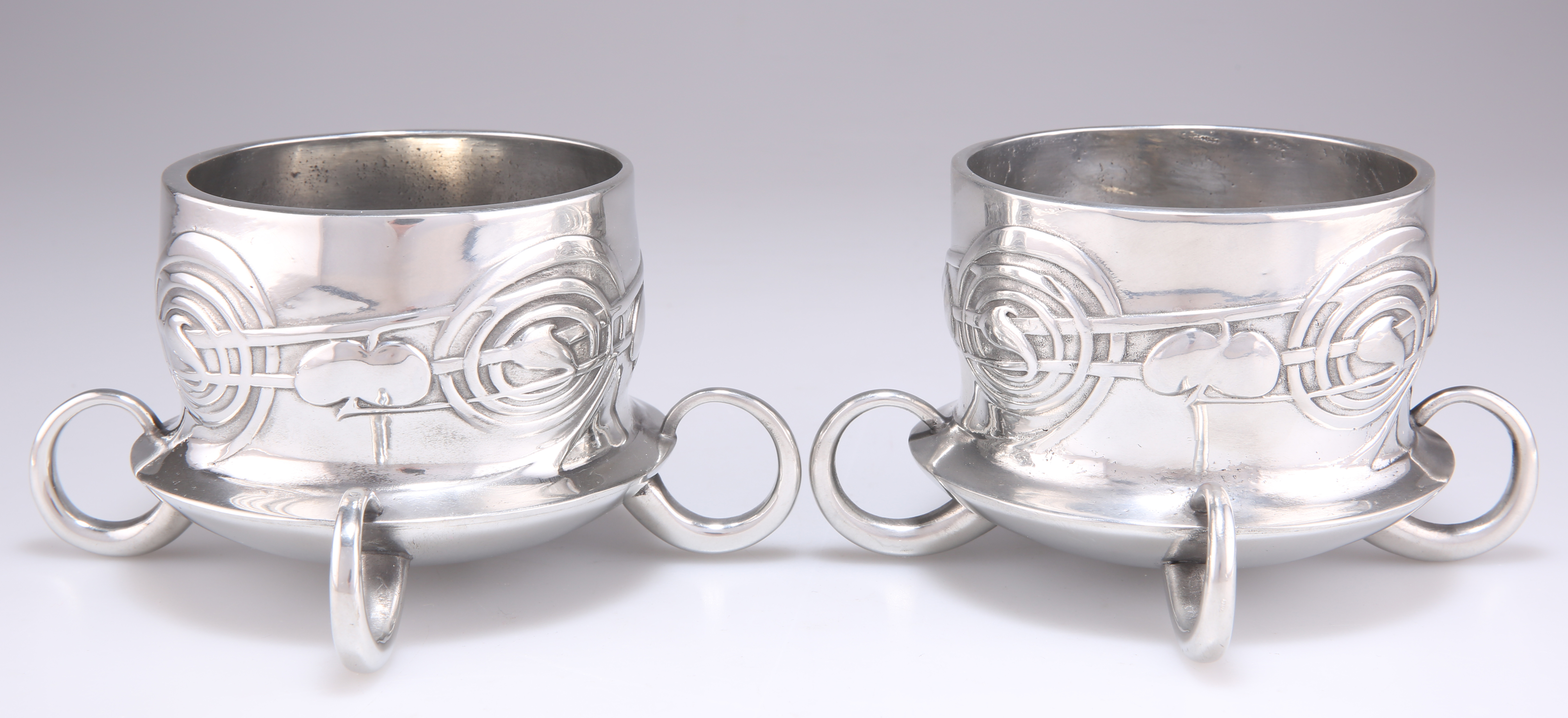 ARCHIBALD KNOX (1864-1933) FOR LIBERTY & CO, A PAIR OF TUDRIC PEWTER FERNER BOWLS, NO.0288