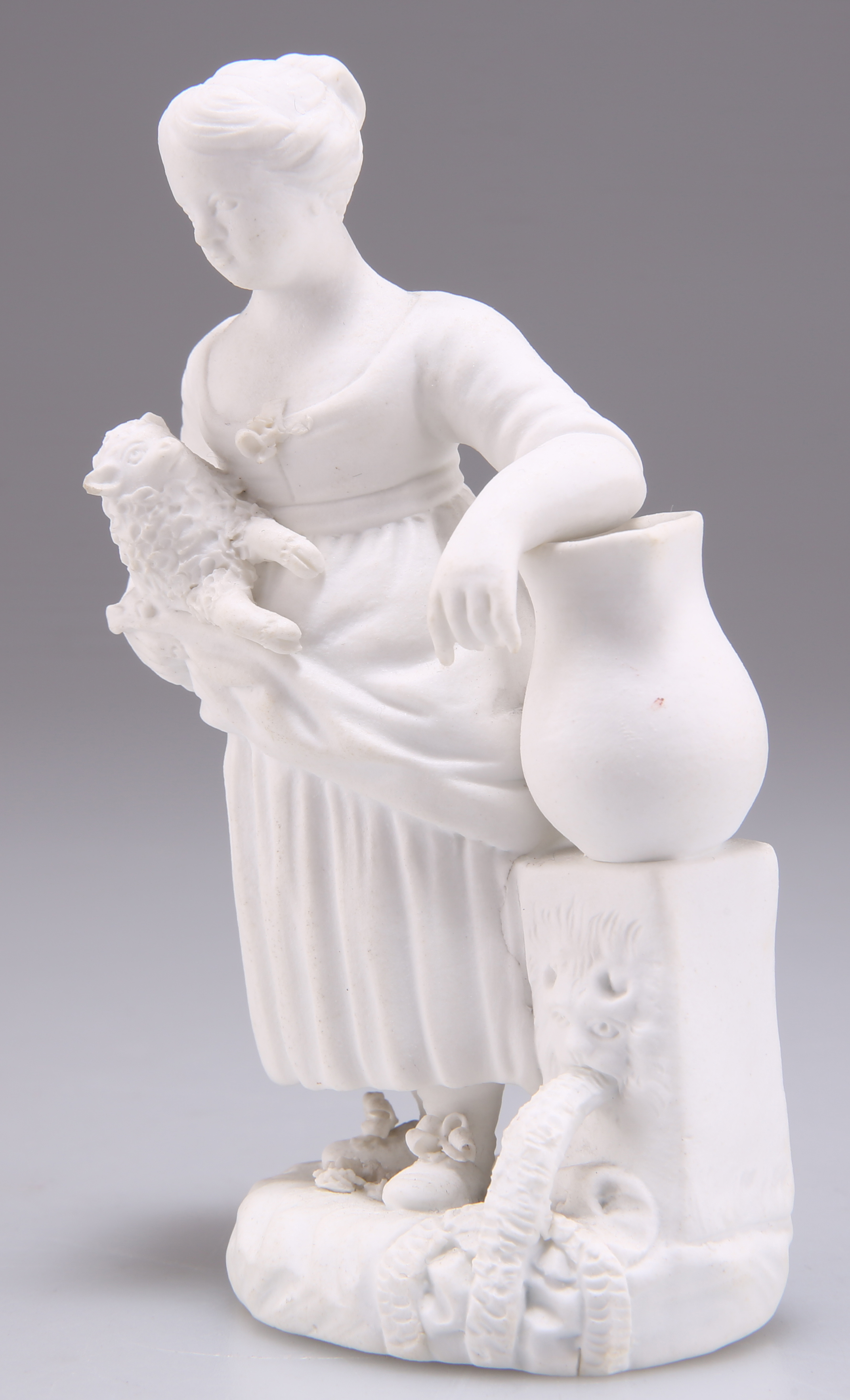 A BISCUIT PORCELAIN FIGURE OF CHILD, PROBABLY ROCKINGHAM