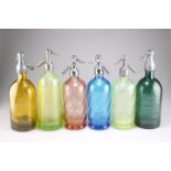A GROUP OF SIX 20TH CENTURY COLOURED GLASS SODA SIPHONS