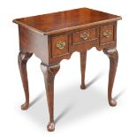 A GEORGIAN STYLE YEW WOOD LOWBOY