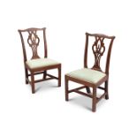 A PAIR OF GEORGE III MAHOGANY “CHIPPENDALE” SIDE CHAIRS