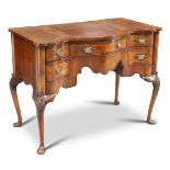 A QUEEN ANNE STYLE WALNUT SERPENTINE DESK