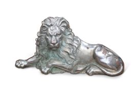 A LARGE CHROMED CAST IRON LION