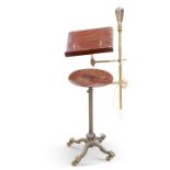 A LATE VICTORIAN BRASS AND MAHOGANY READING STAND