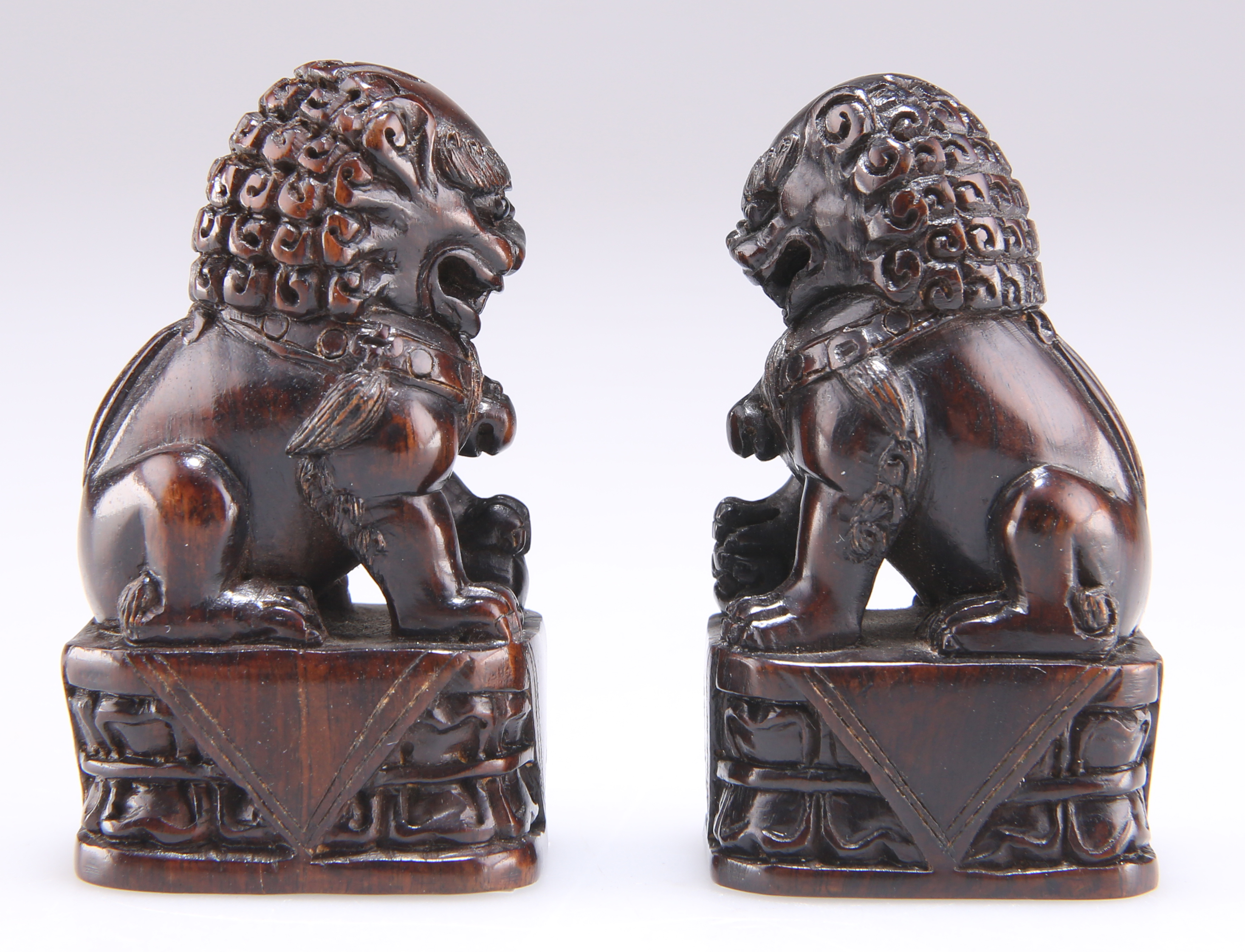 A PAIR OF CHINESE CARVED HARDWOOD MODELS OF TEMPLE DOGS - Image 2 of 2