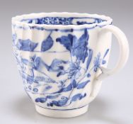 A FACTORY X BLUE AND WHITE SPIRALLY FLUTED COFFEE CUP
