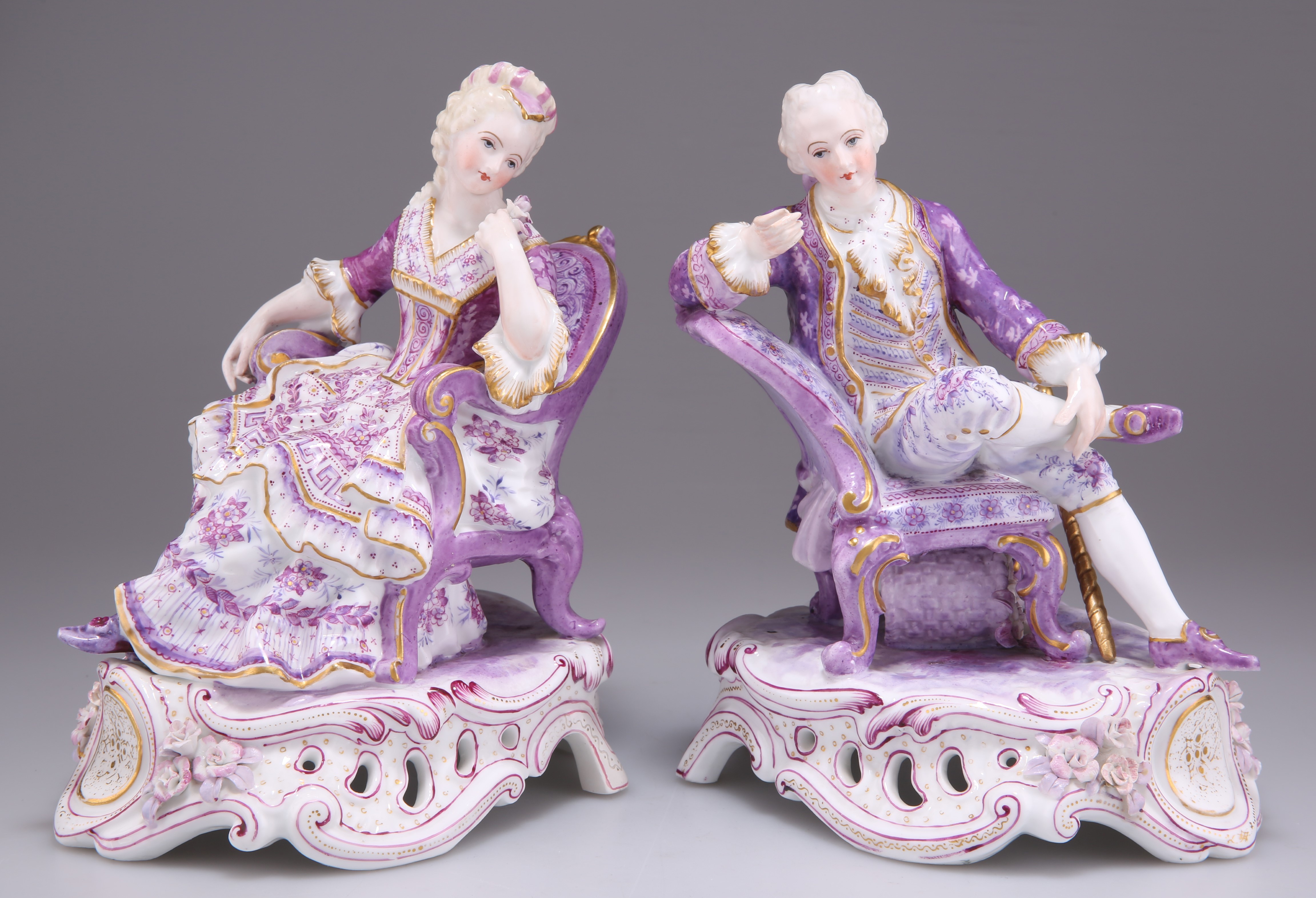 A PAIR OF DRESDEN PORCELAIN FIGURES