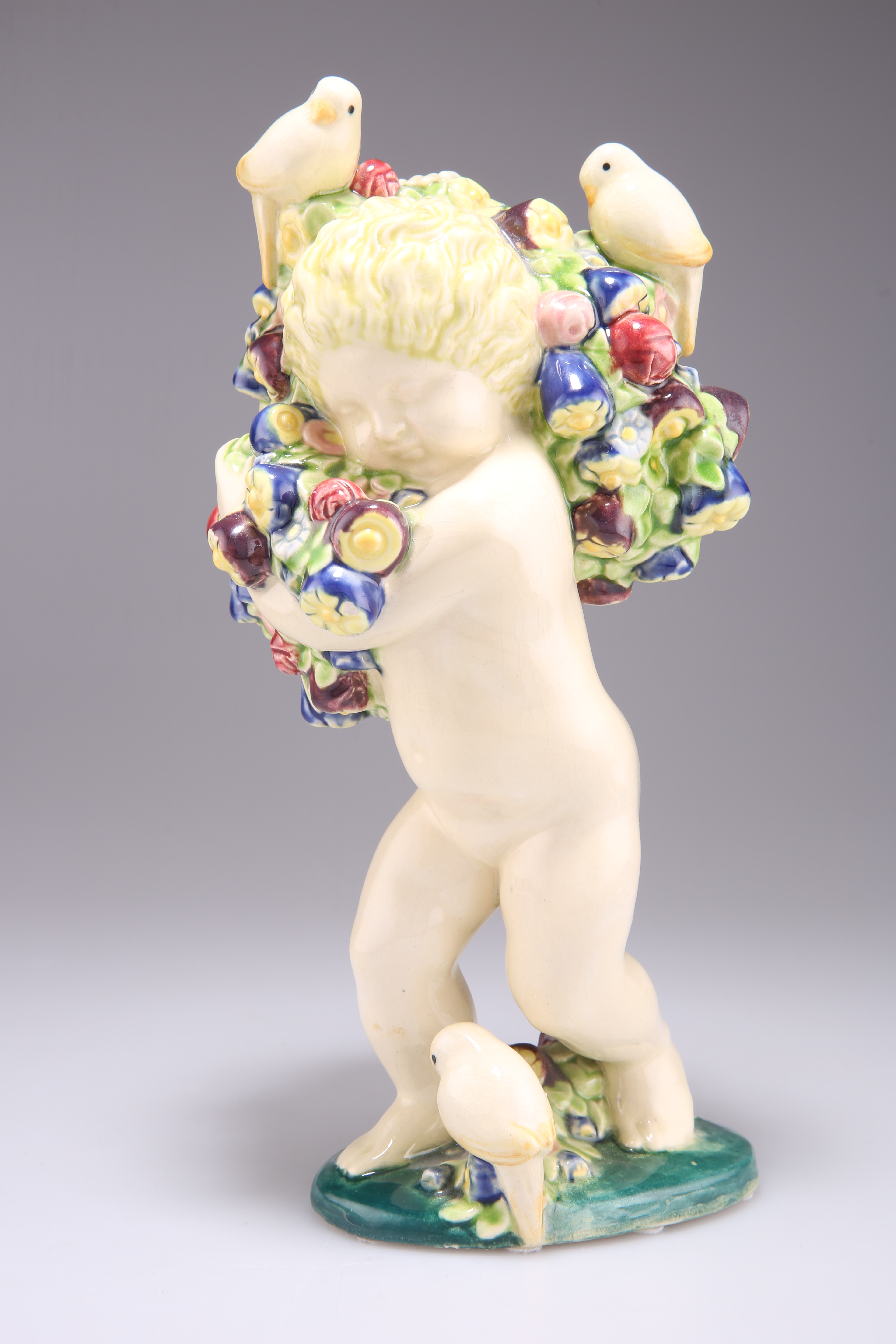 MICHAEL POWOLNY FOR WIENER KERAMIK, AN EARTHENWARE FIGURE